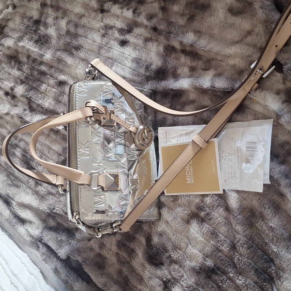 Silver metallic barrel bag